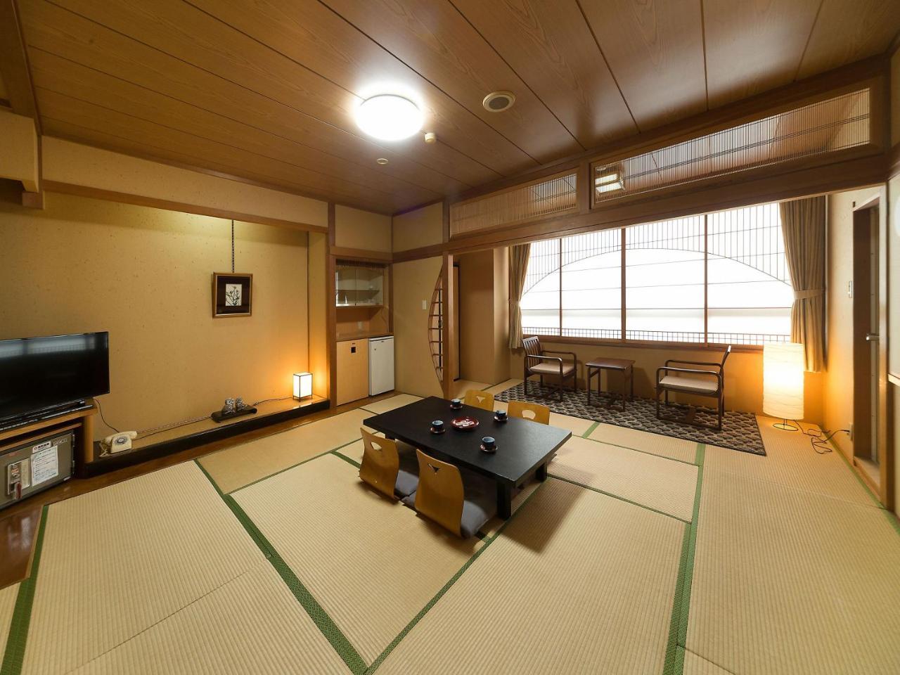 Hotel Awara Onsen Hot Spring Koubou Gurabaatei Esterno foto